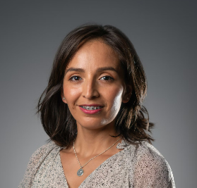 Woman with brown hair smiling